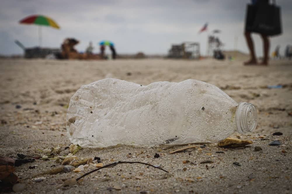 plastic bottle littered on the beach