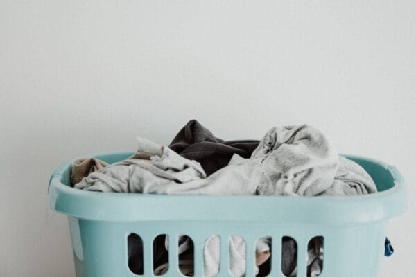 Zero Waste Hacks for Doing Your Laundry_photo of a hamper of laundry