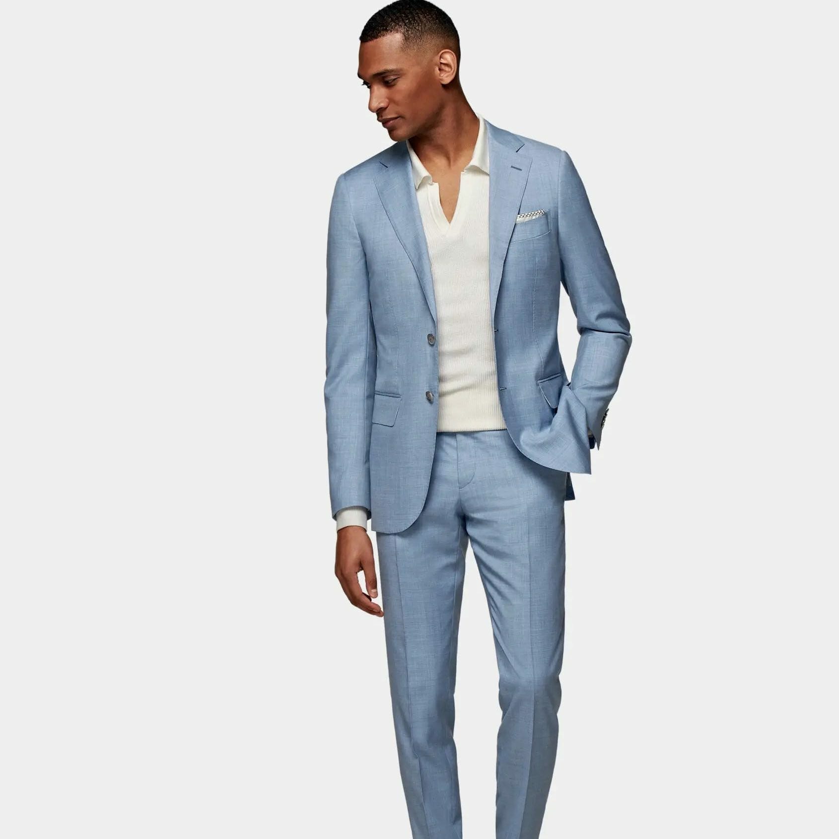 Blue suit with light blue blouse.