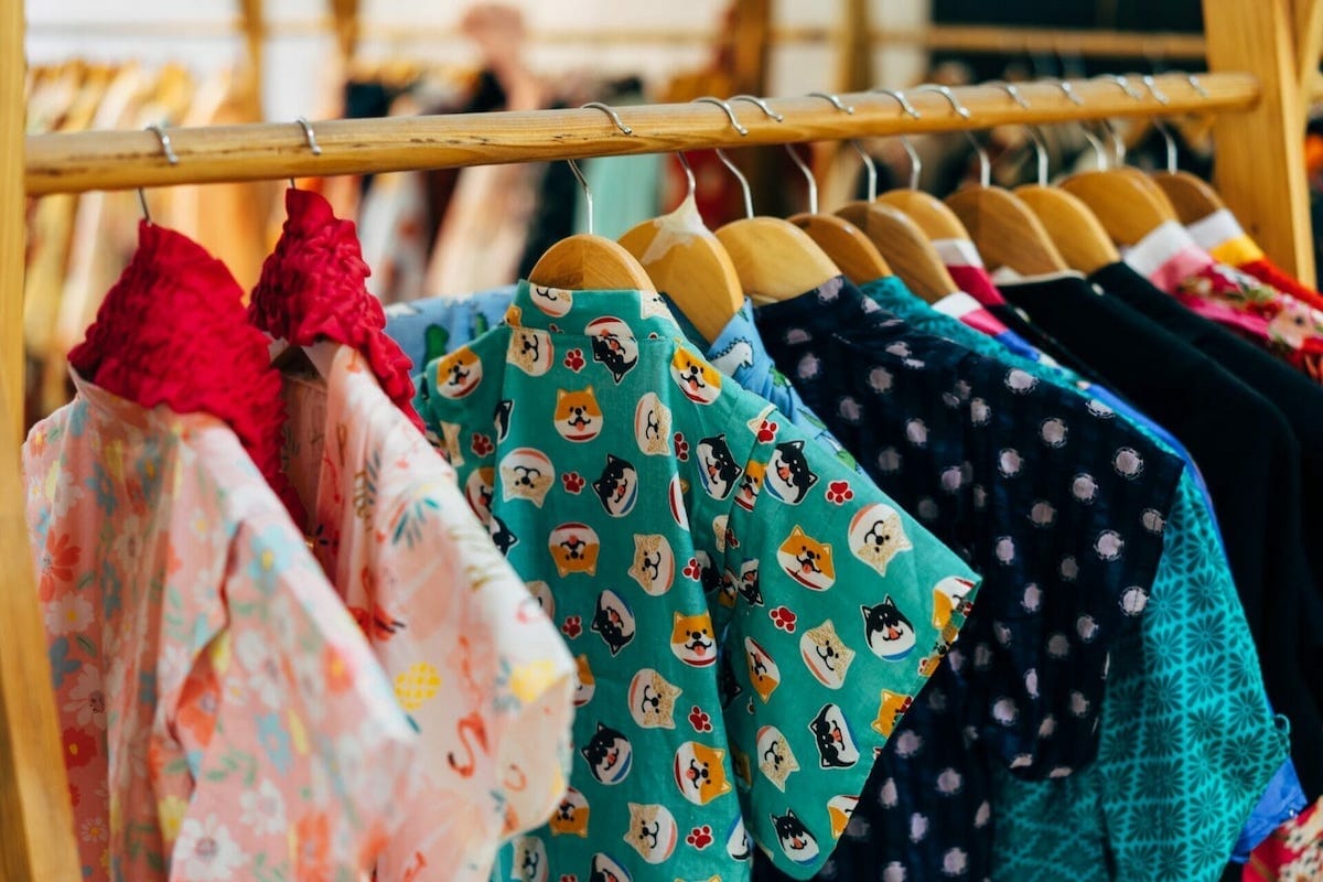 Bright, patterned shirts hanging on a rack