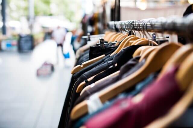 Charity shop shopping rails