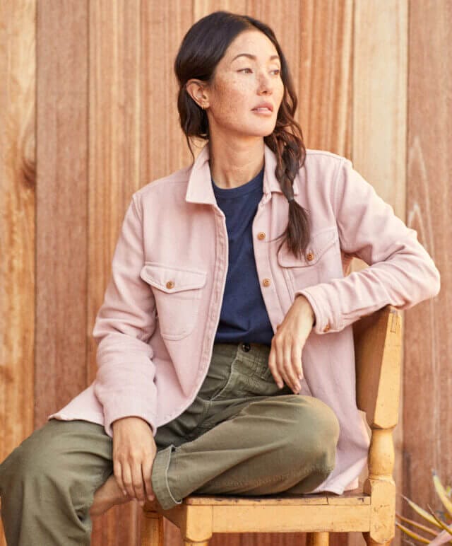 woman wearing Outerknown solid pink overshirt