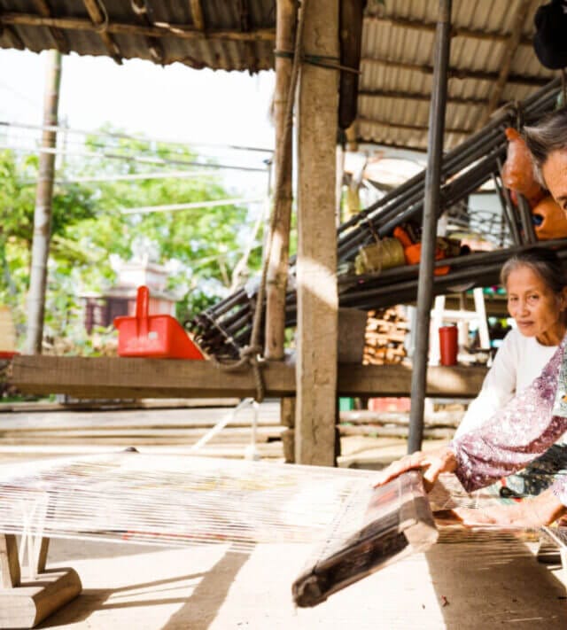how bamboo fabric is made. thread artisan during production process.