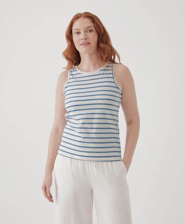 A model showcasing Pact's blue striped shirt