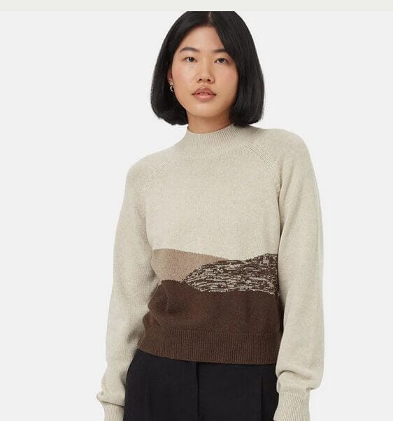 woman wearing tentree sweater with earthy pattern