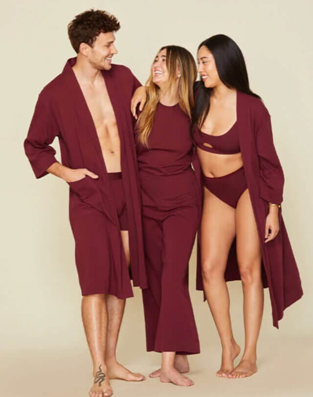 3 models wearing red subset underwear and loungewear
