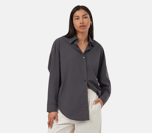 A model showcasing Tentree's dark gray shirt