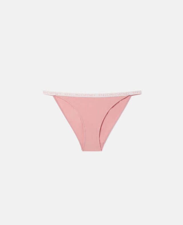 A blush pink Stella McCartney logo tape string briefs made with organic cotton.