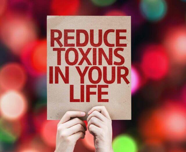 sign says reduce toxins in your life