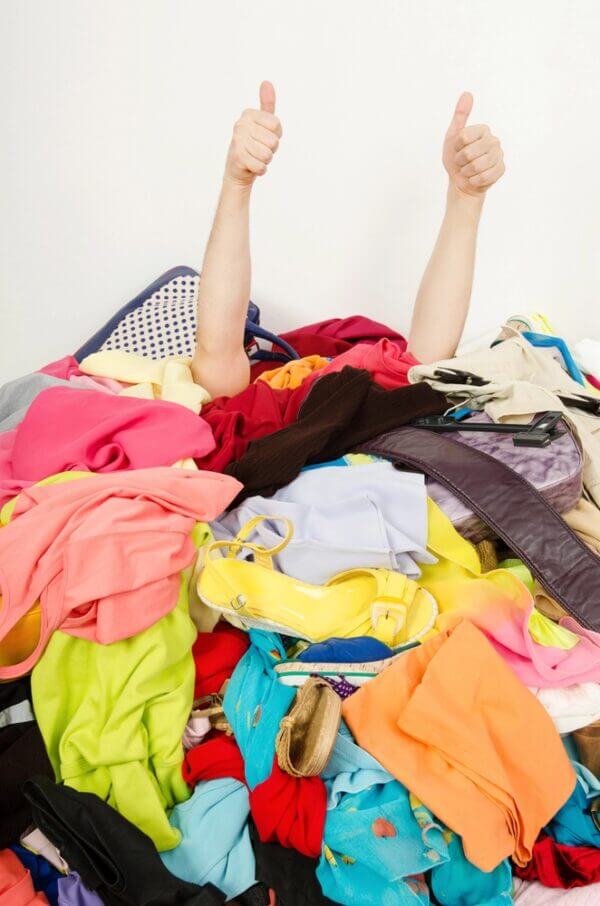 Step two: Piles. Person drowning in pile of clothes.