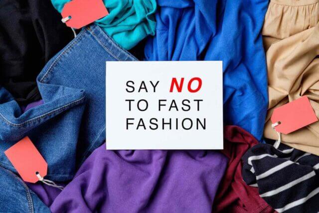 sign says say no to fast fashion