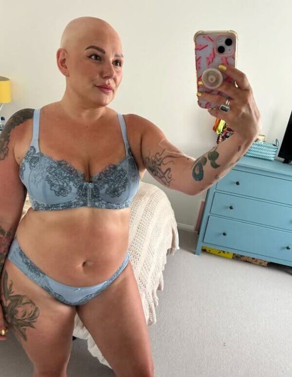 influencer @baldmothertucker taking a selfie of her in her new JulieMay underwear for IG