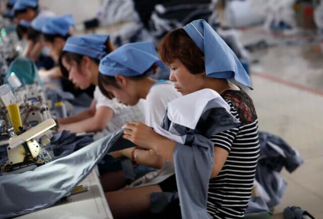Image: Depiction of Women Working in a Garment Factory