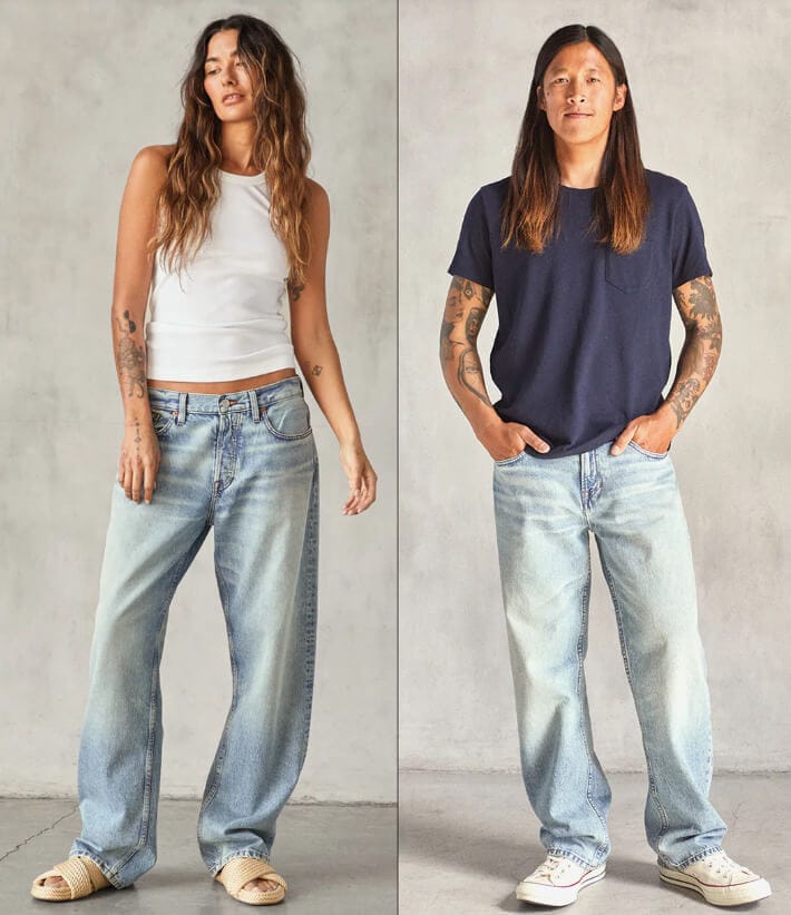 A picture of a woman and a man wearing the same unisex denim from outerknown.