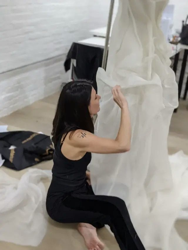 Michelle founder of Fite Fashion working in the studio